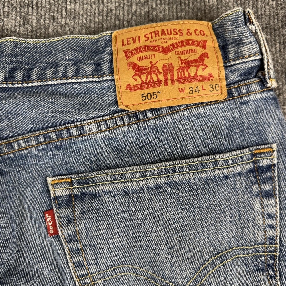 Levis 505 Jeans Mens 34x30 Light Wash Blue Straight Denim Stain Workwear - Picture 8 of 9